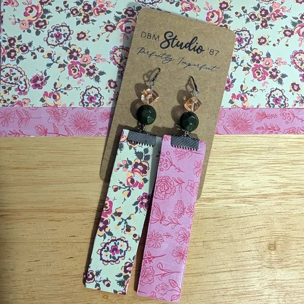 Pink, purple and green floral earrings with pink floral backs. Green and pink beads with pewter tone. Front and back are shown.